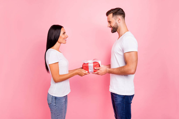 Photo of cheerful charming nice couple weairng jeans of friends with boy congratulating girl happy birthday while isolated with pastel background - Zdjęcie, obraz