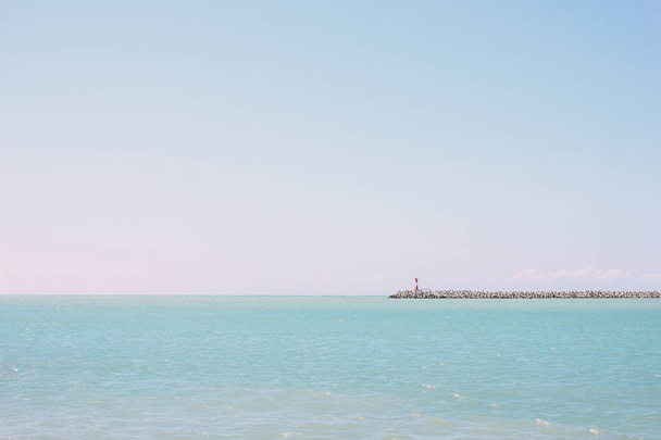 Minimal landscape of Black sea with lighthouse, Sochi, Russia, nature background - Foto, afbeelding