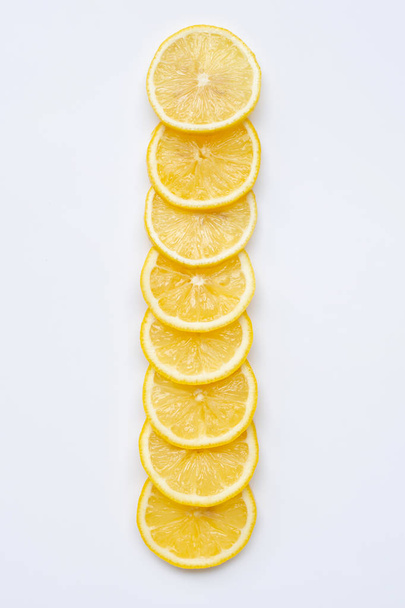 Fresh lemon slices on white - Фото, изображение