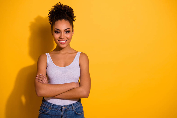 Close up photo cute beautiful amazing she her dark skin lady arms crossed successful professional summer vacation weekend toothy wait rest relax wear casual tank-top isolated vivid yellow background - Valokuva, kuva