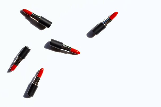 Flat lay composition, Lipsticks on white background with shadow. - Fotografie, Obrázek