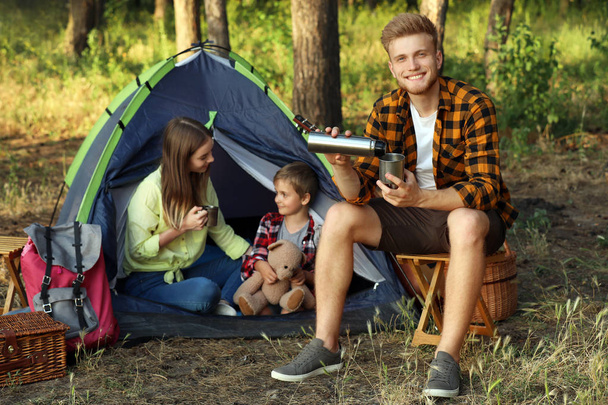 Happy family spending weekend in forest - Photo, Image