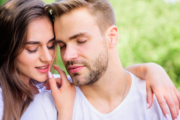 Attractive couple. Sexual attraction. Relaxing with darling. Lovers cuddling. Couple in love. Trust and intimacy. Sensual hug. Love romance concept. Romantic date. Handsome man pretty girl in love - Фото, изображение
