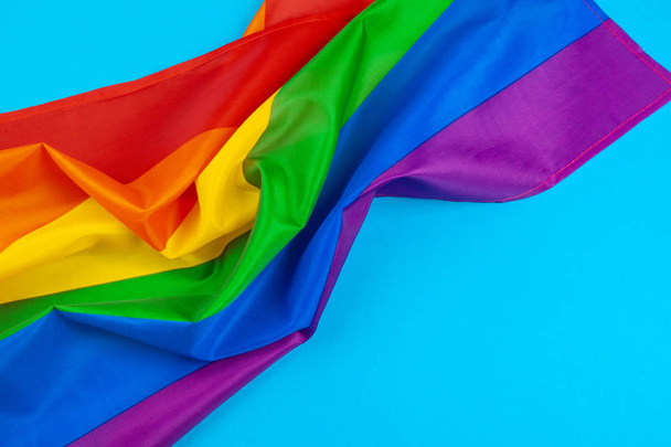 Fabric texture of gay rainbow flag close up - Фото, изображение