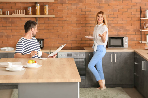 Happy couple in kitchen at home - Foto, immagini