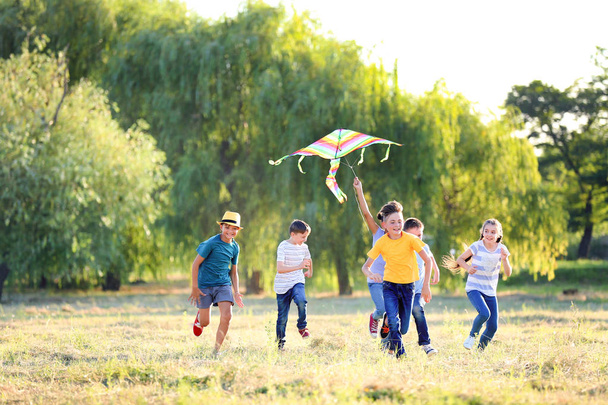 Children flying kite on summer day - Photo, Image