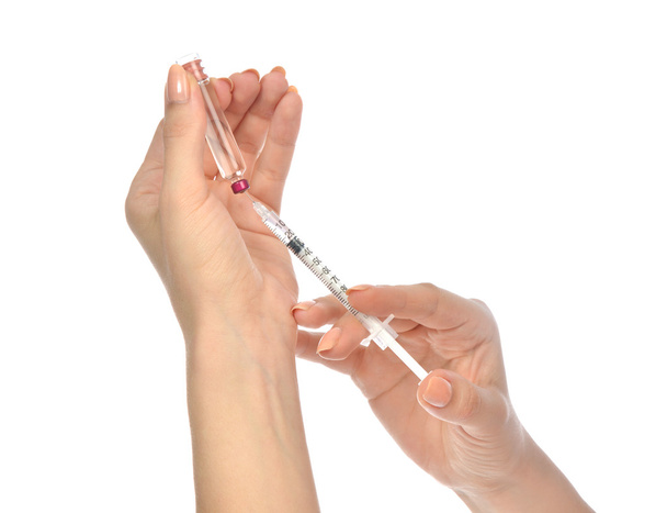 medical syringe with needle in ampule getting - Fotoğraf, Görsel