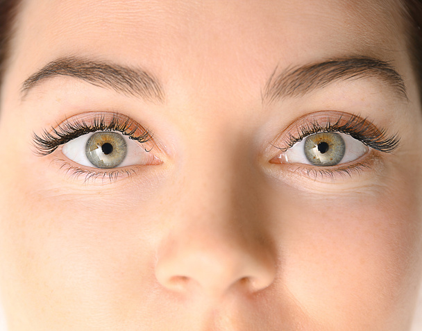 Beautiful young woman with eyelash extensions, closeup - Photo, image