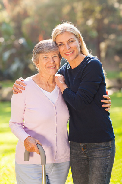 mature woman with her senior mother outdoors - Foto, immagini