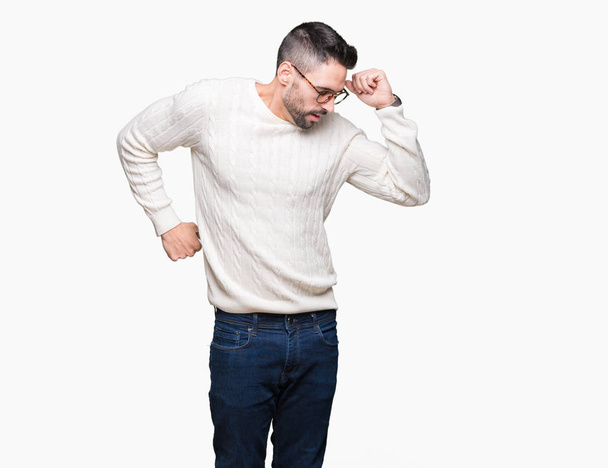 Young handsome man wearing glasses over isolated background stretching back, tired and relaxed, sleepy and yawning for early morning - Φωτογραφία, εικόνα