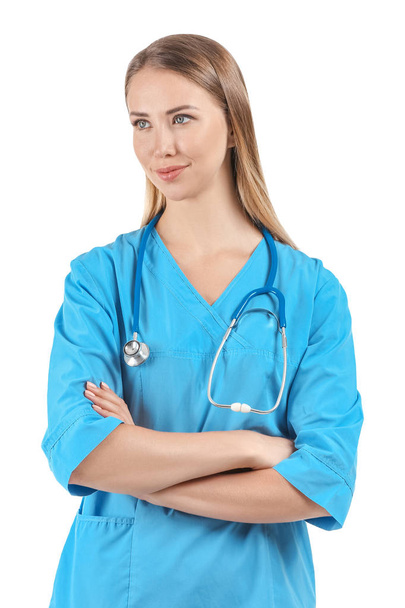 Female nurse with stethoscope on white background - 写真・画像
