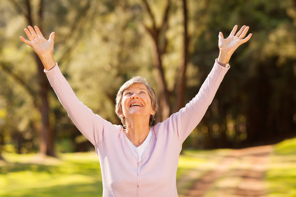 healthy elderly woman arms outstretched - Photo, image