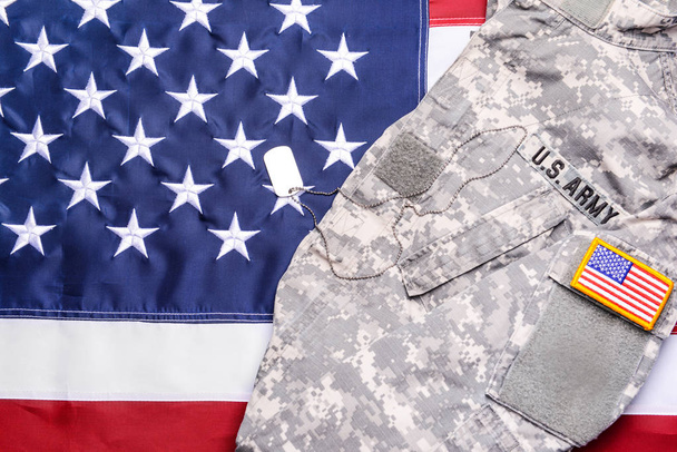 Military uniform on USA flag - Foto, imagen