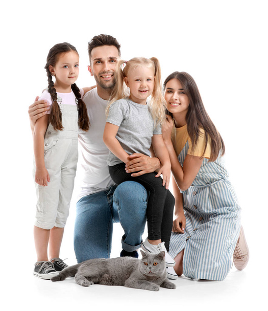 Happy family with cute cat on white background - Photo, Image