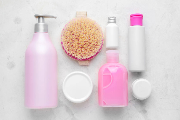 Set of cosmetic products on light background - Foto, imagen