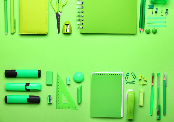 Set of school supplies on color background - Фото, изображение