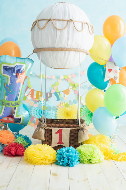 toy air balloon with decorations for boy first birthday, celebration concept  - Фото, зображення