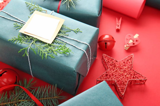 Beautiful Christmas gift boxes on color background - Photo, Image