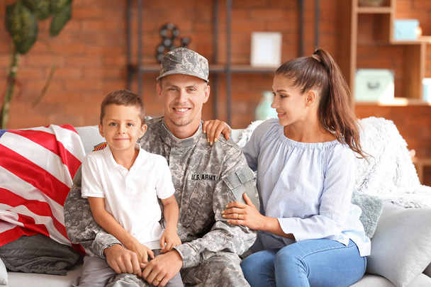Happy military man with his family at home - Photo, Image