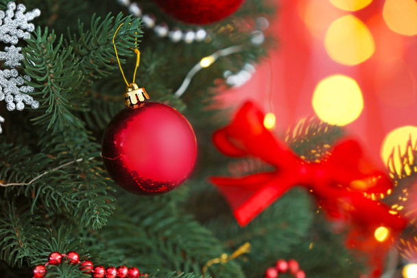Beautiful Christmas tree against defocused lights, closeup - Zdjęcie, obraz