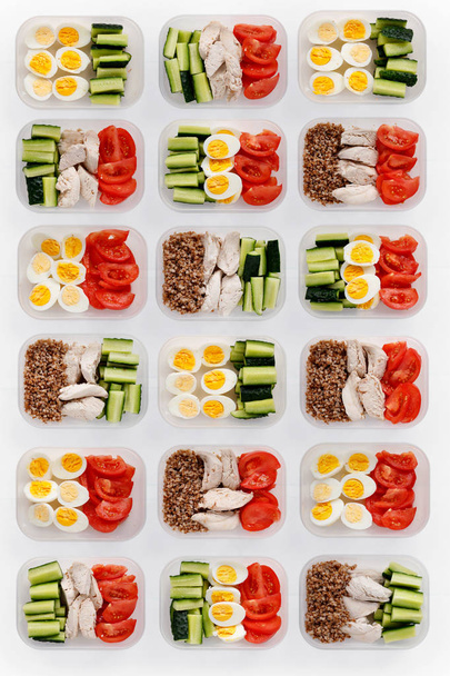 Healthy food distributed in containers. Top view. - 写真・画像