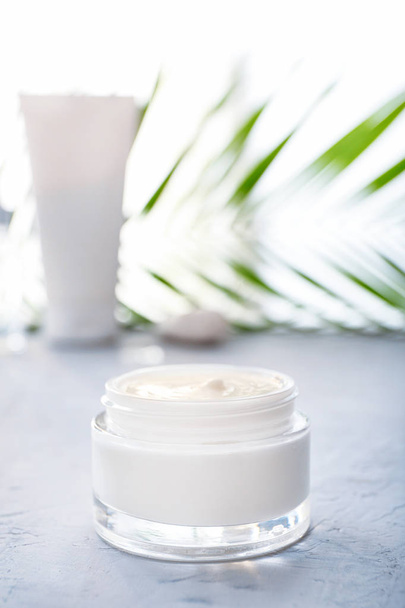 Jar of body cream on white table - Фото, зображення