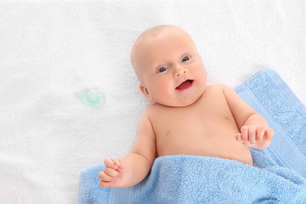 Cute little baby lying on soft towel - Photo, Image