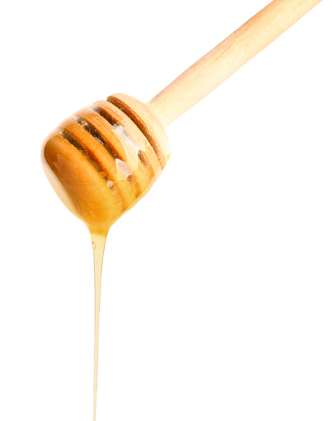 Wooden honey dipper on white background - Fotografie, Obrázek
