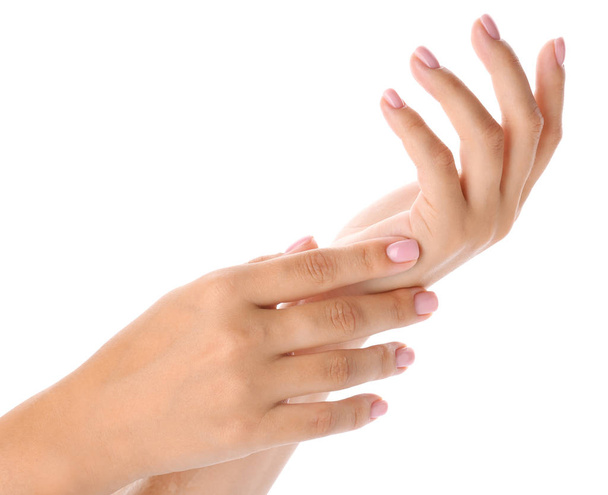 manos femeninas con hermosa manicura sobre fondo blanco - Foto, Imagen