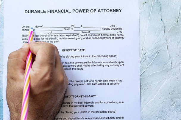 Filling durable financial Power of Attorney Form or POA document - Photo, image