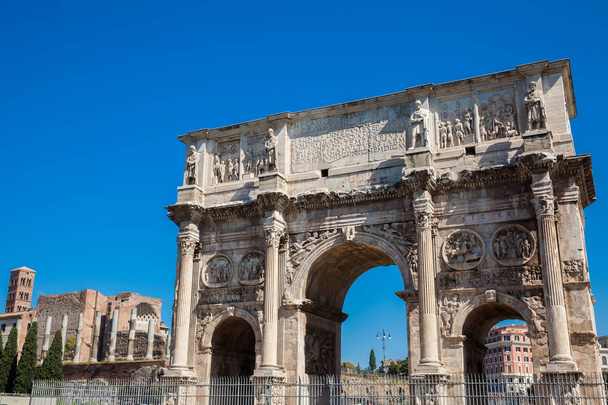The Arch of Constantine a triumphal arch in Rome, situated between the Colosseum and the Palatine Hill built on the year 315 AD - Photo, Image