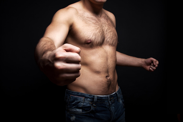Young shirtless muscular man - Fotó, kép