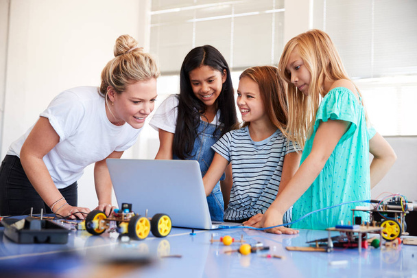 Three Female Students With Teacher Building Robot Vehicle In After School Computer Coding Class - Fotoğraf, Görsel