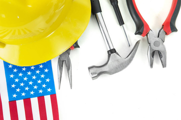 American flag with construction equipment - 写真・画像
