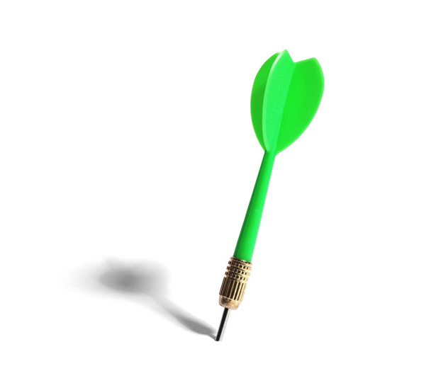 Green dart arrow for game on white background - Foto, imagen