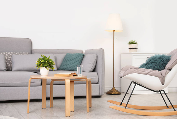 Modern living room interior with comfortable sofa - Photo, image
