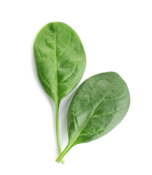 Fresh green leaves of healthy baby spinach on white background, top view - Photo, image