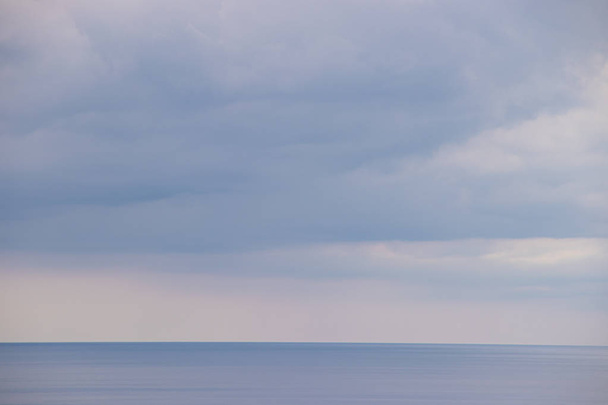 Calm sea on cloudy sky background, Anapa district, Sukko, Russia - Photo, Image