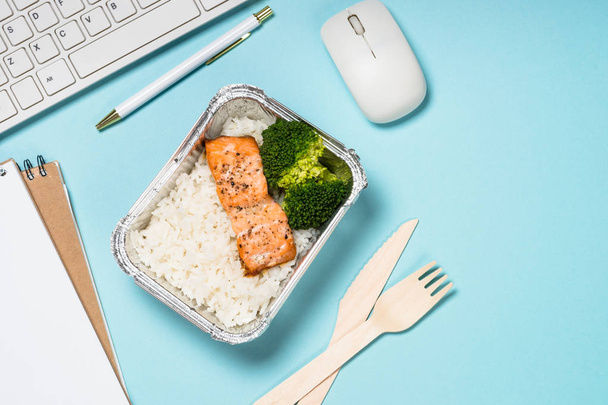 Food delivery concept - healthy lunch on office table. - Photo, Image