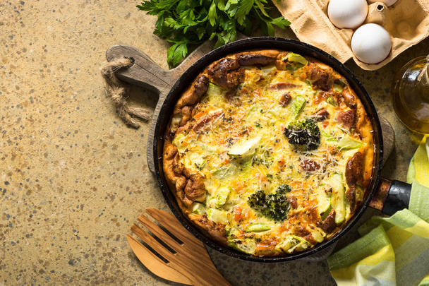 Frittata with sausage and vegetables in skillet. - Photo, Image