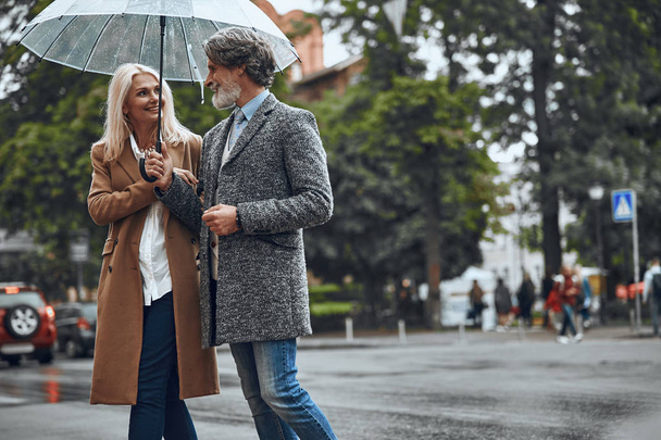 Walking together in any weather stock photo - Photo, Image