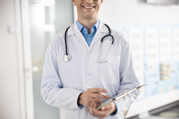Happy doctor waiting for patient stock photo - Photo, Image