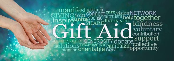 Give what you can Gift Aid Campaign Word Cloud  - female hands in gentle offering gesture beside a GIFT AID word cloud on a green and sparkling background - Photo, Image