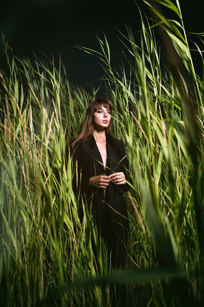 Woman in the grass - Фото, зображення