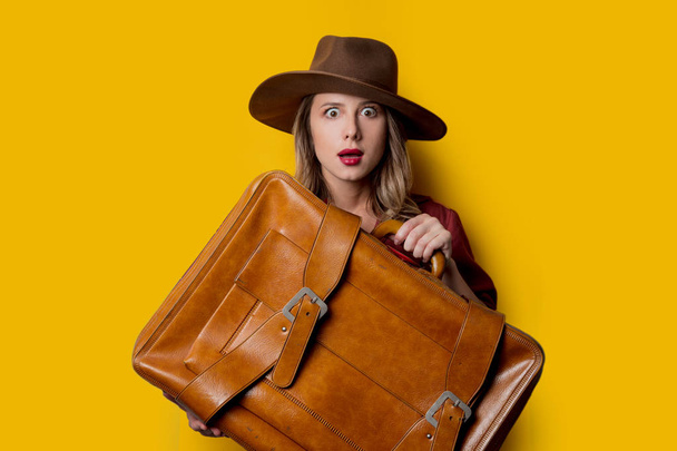 Young woman in hat with suitcase - Photo, Image