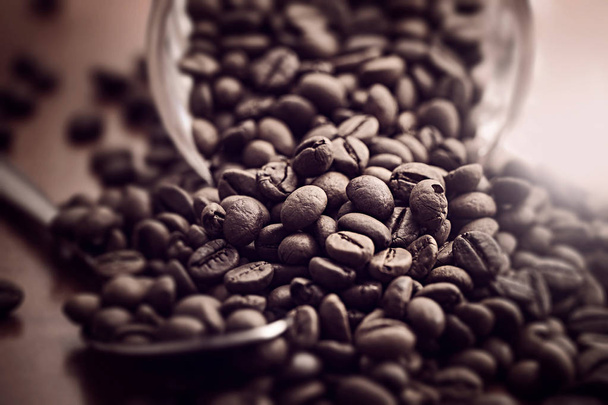 кавові зерна в склянці
 - Фото, зображення