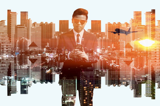Businessmen and cityscape double exposure background - Photo, Image