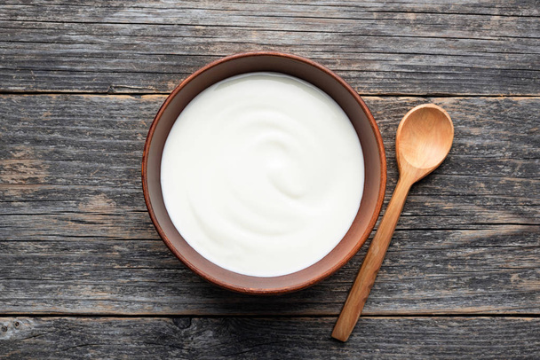 Natural yogurt in ceramic bowl - Fotó, kép
