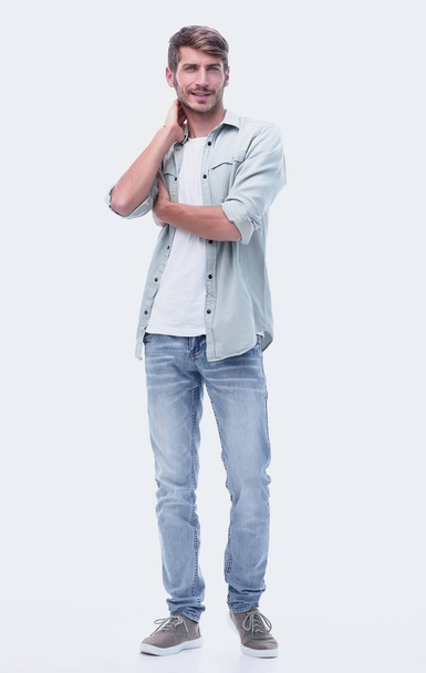 in full growth. modern young man in jeans - Φωτογραφία, εικόνα