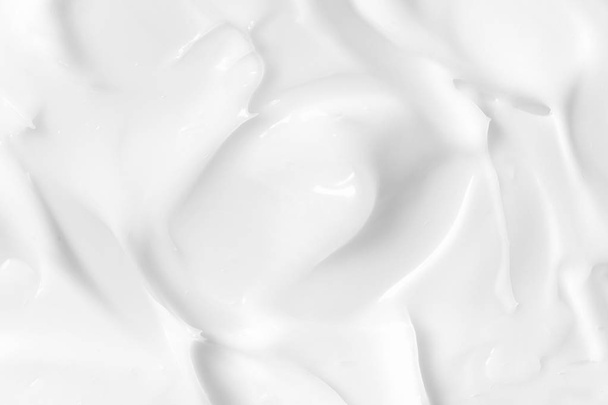 Lotion texture. White skin care cream background. Cosmetic creamy smudge - Photo, Image
